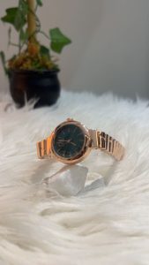 calvin klein rose gold round black dial